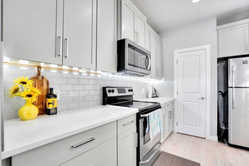 1322 Walden Drive Se, Calgary, AB - Indoor Photo Showing Kitchen With Stainless Steel Kitchen With Upgraded Kitchen