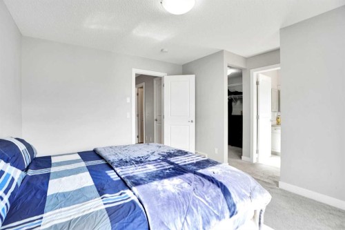 1322 Walden Drive Se, Calgary, AB - Indoor Photo Showing Bedroom