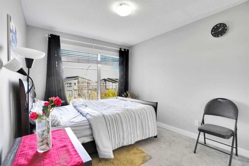 1322 Walden Drive Se, Calgary, AB - Indoor Photo Showing Bedroom