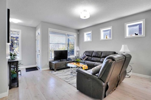 1322 Walden Drive Se, Calgary, AB - Indoor Photo Showing Living Room