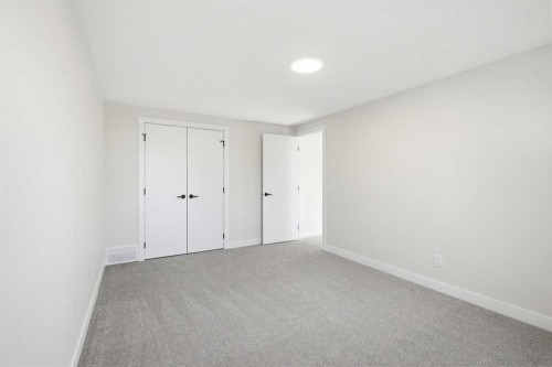 5610 Pensacola Crescent Se, Calgary, AB - Indoor Photo Showing Other Room