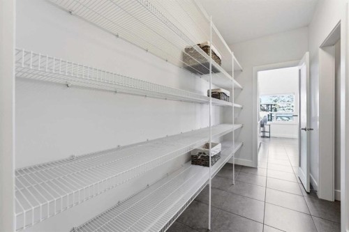 16 Hamptons Cove Nw, Calgary, AB - Indoor With Storage