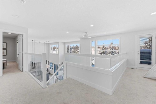 16 Hamptons Cove Nw, Calgary, AB - Indoor Photo Showing Other Room