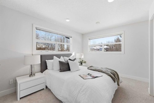 16 Hamptons Cove Nw, Calgary, AB - Indoor Photo Showing Bedroom