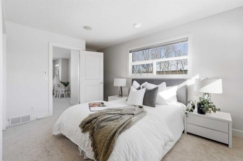 16 Hamptons Cove Nw, Calgary, AB - Indoor Photo Showing Bedroom