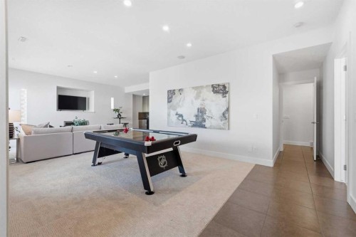 16 Hamptons Cove Nw, Calgary, AB - Indoor Photo Showing Other Room