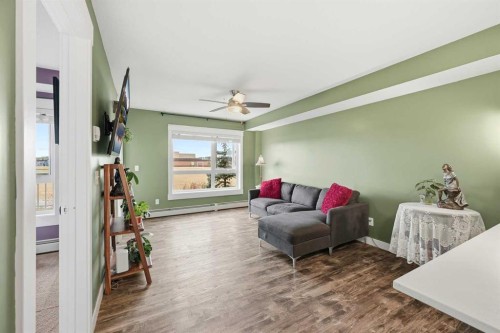 7206-302 Skyview Ranch Drive Ne, Calgary, AB - Indoor Photo Showing Living Room