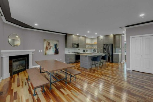 7314 34 Avenue Nw, Calgary, AB - Indoor Photo Showing Living Room With Fireplace