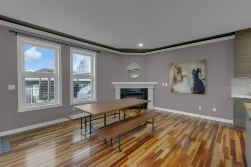 7314 34 Avenue Nw, Calgary, AB - Indoor Photo Showing Living Room With Fireplace