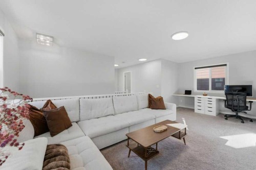 34 Walgrove Link Se, Calgary, AB - Indoor Photo Showing Living Room
