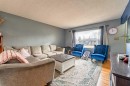 424 Tavender Road Nw, Calgary, AB  - Indoor Photo Showing Living Room 