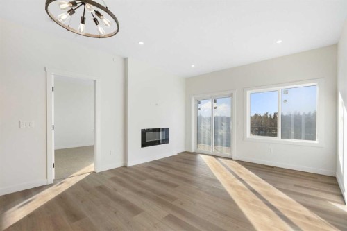 23 St. Andrews Close, Lyalta, AB - Indoor With Fireplace
