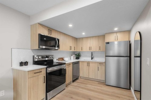 198 Silver Brook Road Nw, Calgary, AB - Indoor Photo Showing Kitchen