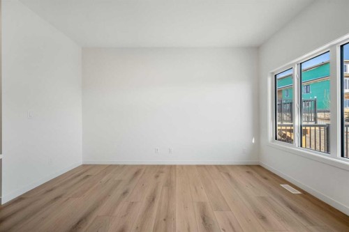 27 Heritage Heath, Cochrane, AB - Indoor Photo Showing Other Room
