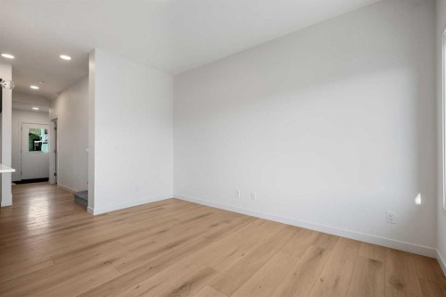 27 Heritage Heath, Cochrane, AB - Indoor Photo Showing Other Room