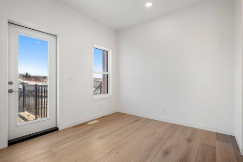 27 Heritage Heath, Cochrane, AB - Indoor Photo Showing Other Room