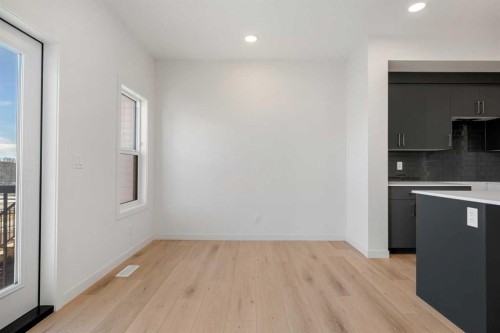 27 Heritage Heath, Cochrane, AB - Indoor Photo Showing Kitchen