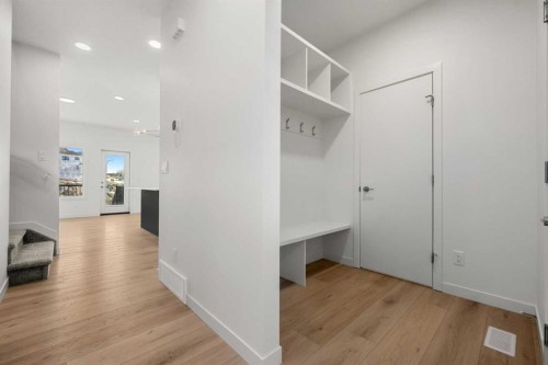 27 Heritage Heath, Cochrane, AB - Indoor Photo Showing Other Room
