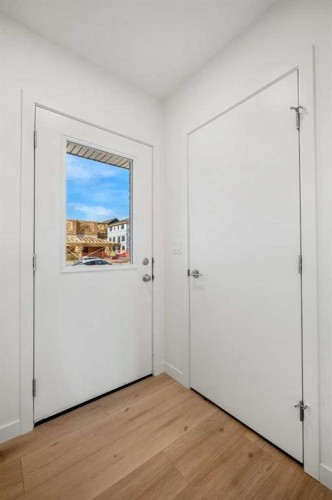 27 Heritage Heath, Cochrane, AB - Indoor Photo Showing Other Room