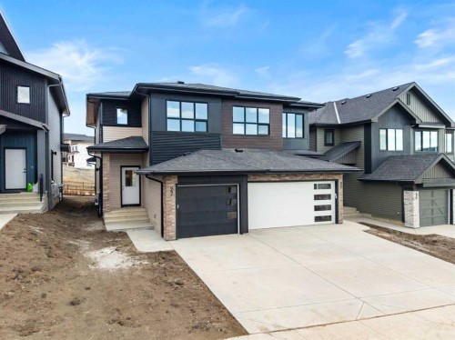27 Heritage Heath, Cochrane, AB - Outdoor With Facade