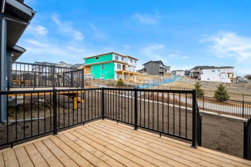 27 Heritage Heath, Cochrane, AB - Outdoor With Deck Patio Veranda With Exterior