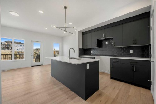 27 Heritage Heath, Cochrane, AB - Indoor Photo Showing Kitchen With Upgraded Kitchen