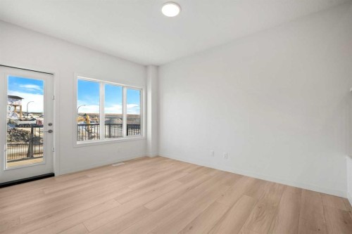 31 Heritage Heath, Cochrane, AB - Indoor Photo Showing Other Room