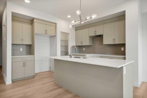 31 Heritage Heath, Cochrane, AB - Indoor Photo Showing Kitchen