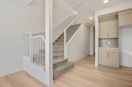 31 Heritage Heath, Cochrane, AB - Indoor Photo Showing Other Room