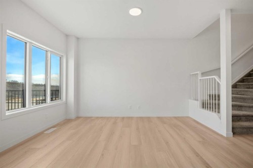 31 Heritage Heath, Cochrane, AB - Indoor Photo Showing Other Room