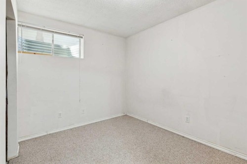 47 Covewood Park Ne, Calgary, AB - Indoor Photo Showing Other Room