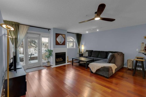 103-923 15 Avenue Sw, Calgary, AB - Indoor Photo Showing Living Room With Fireplace