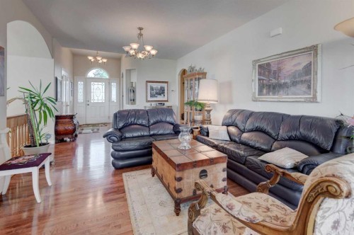 49 Arbour Crest Heights Nw, Calgary, AB - Indoor Photo Showing Living Room