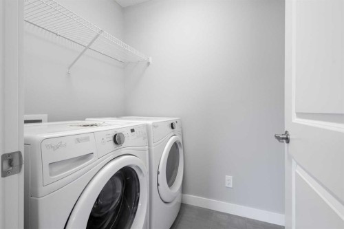 13 Howse Row Ne, Calgary, AB - Indoor Photo Showing Laundry Room