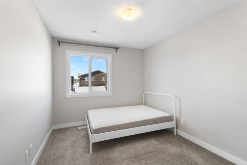 13 Howse Row Ne, Calgary, AB - Indoor Photo Showing Bedroom