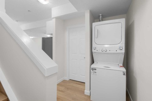 13 Howse Row Ne, Calgary, AB - Indoor Photo Showing Laundry Room