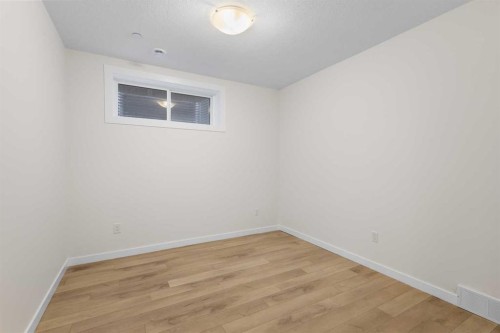 13 Howse Row Ne, Calgary, AB - Indoor Photo Showing Other Room