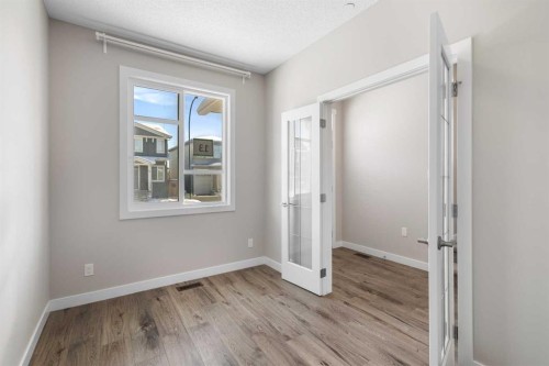 13 Howse Row Ne, Calgary, AB - Indoor Photo Showing Other Room