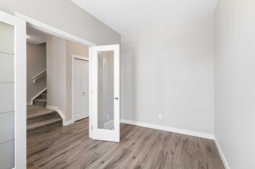 13 Howse Row Ne, Calgary, AB - Indoor Photo Showing Other Room