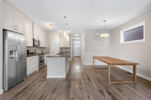 13 Howse Row Ne, Calgary, AB - Indoor Photo Showing Kitchen With Stainless Steel Kitchen With Upgraded Kitchen