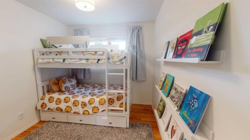 84 Sunmount Road Se, Calgary, AB - Indoor Photo Showing Bedroom