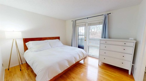 84 Sunmount Road Se, Calgary, AB - Indoor Photo Showing Bedroom