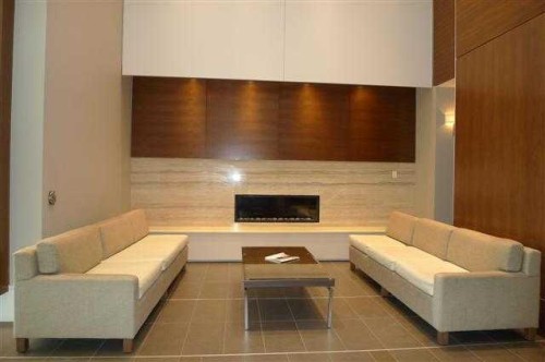 416-222 Riverfront Avenue Sw, Calgary, AB - Indoor Photo Showing Living Room With Fireplace