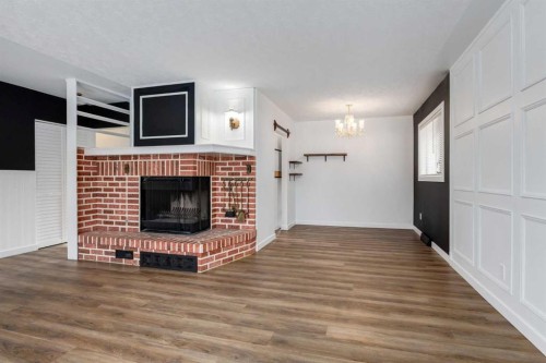 651 84 Avenue Sw, Calgary, AB - Indoor With Fireplace