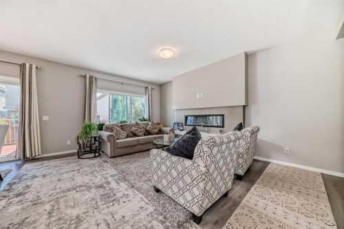 17 Walgrove Manor Se, Calgary, AB - Indoor Photo Showing Living Room With Fireplace