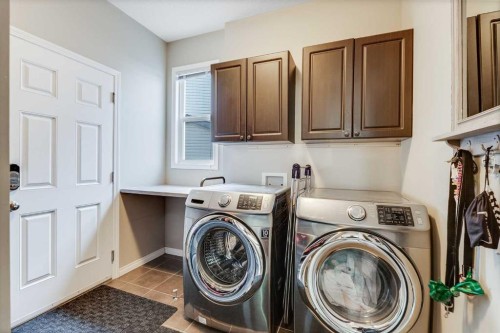 113 Copperpond Bay Se, Calgary, AB - Indoor Photo Showing Laundry Room