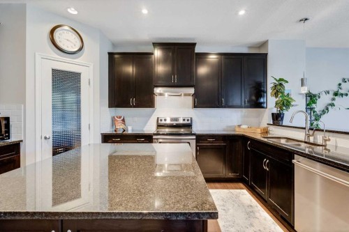 113 Copperpond Bay Se, Calgary, AB - Indoor Photo Showing Kitchen With Stainless Steel Kitchen With Upgraded Kitchen