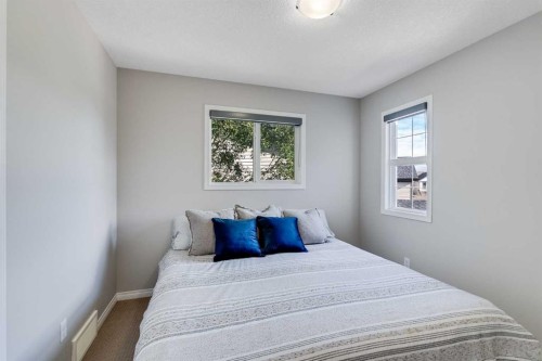 113 Copperpond Bay Se, Calgary, AB - Indoor Photo Showing Bedroom