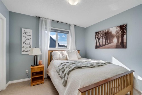 113 Copperpond Bay Se, Calgary, AB - Indoor Photo Showing Bedroom