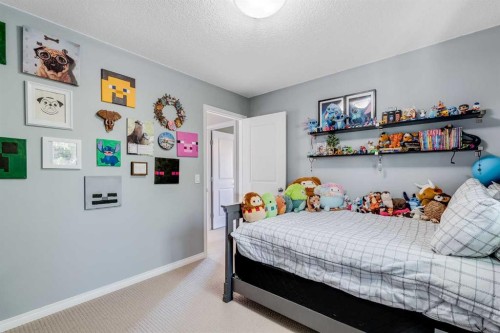 113 Copperpond Bay Se, Calgary, AB - Indoor Photo Showing Bedroom